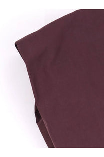Alysi women’s cotton top in rich burgundy with smooth textured fabric and neatly folded edges
