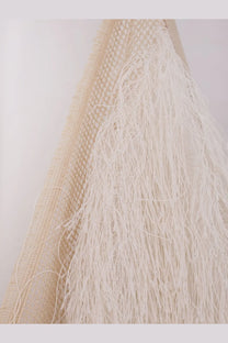 Alysi women’s cream-colored mesh tote bag with long flowing white fringe in fringed top meringa style