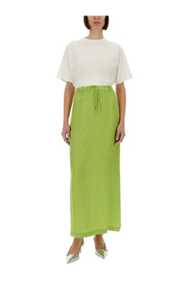 Alysi women’s long silk skirt in vibrant lime green with a flowing high waist and front drawstring tie