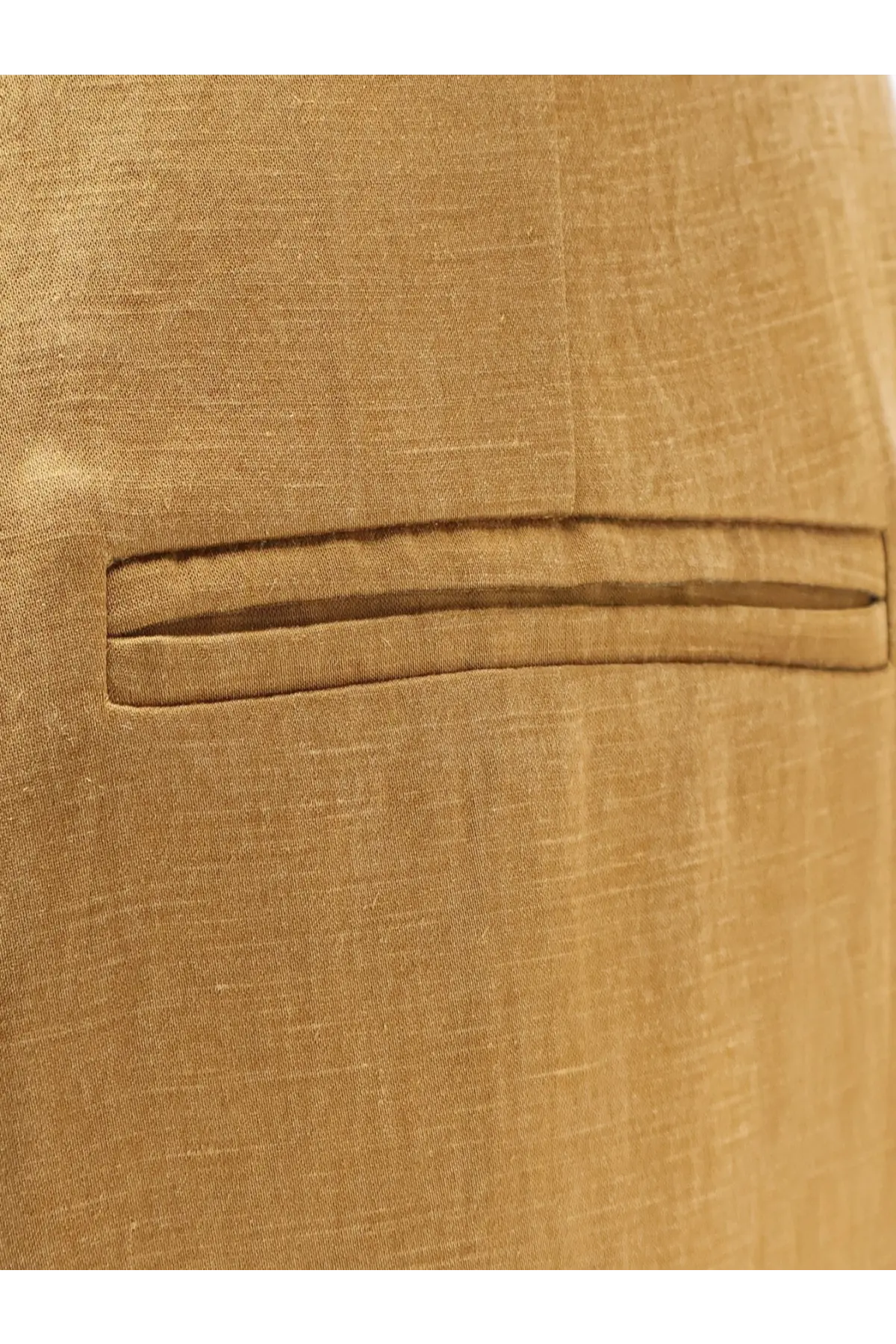 A close-up of alysi women’s tan linen and lyocell trousers showing subtle texture and embroidered pocket detail