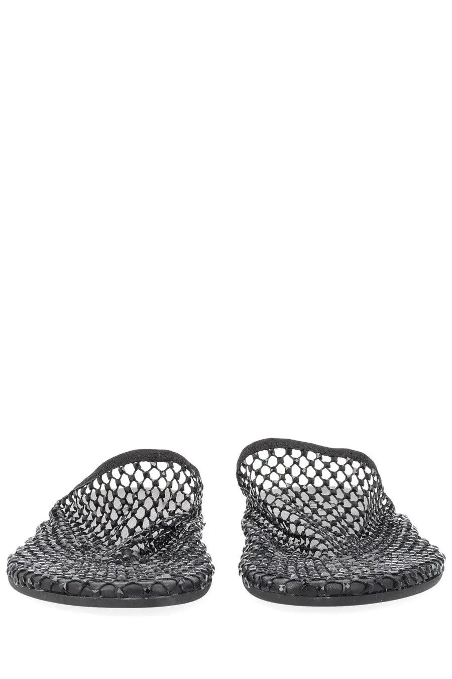 Alysi women’s mule shoe black featuring black mesh slide sandals with woven open-knit design and rubber soles