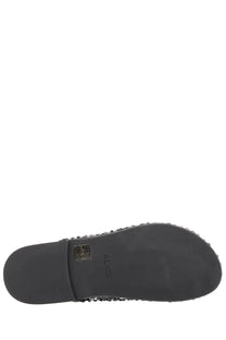 Alysi women’s black mule shoe showing the black rubber sole with textured beaded edge and white Alysi logo