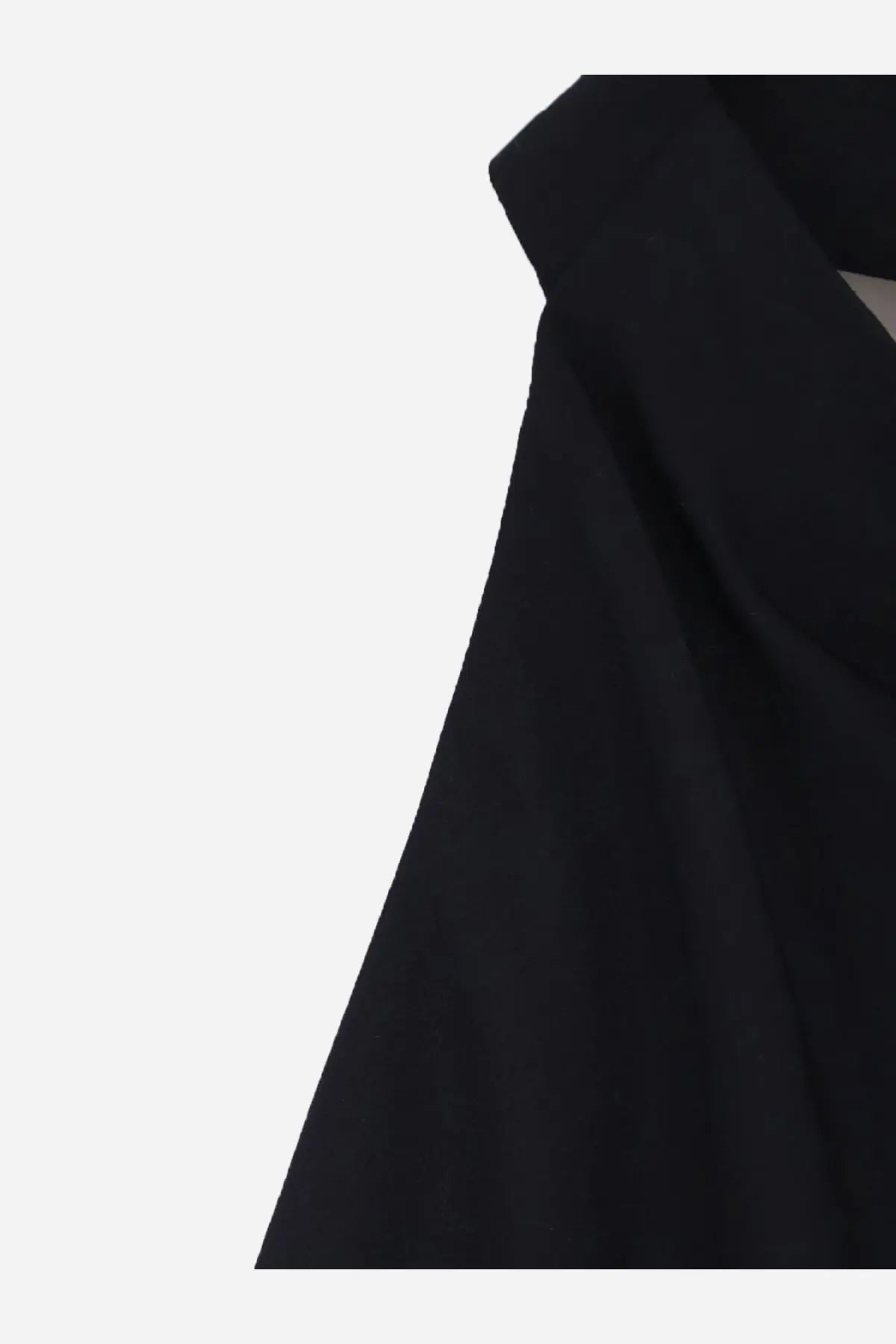 Black fabric sleeve of alysi womens peach touch top with smooth texture and subtle folds