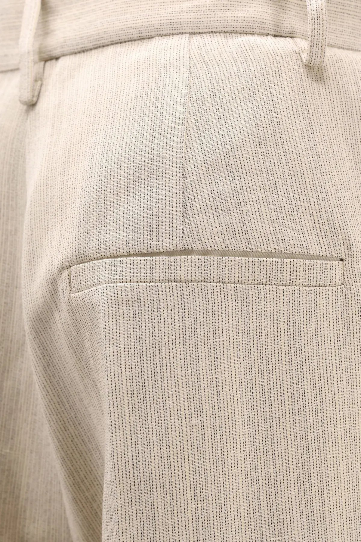 Alysi women’s beige sartorial viscose and linen trousers with a subtle woven pattern and stitched front pocket