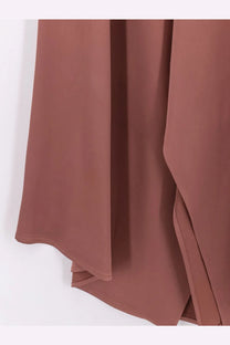 Alysi women’s satin skirt blue with a flowing rust-colored chiffon overlay featuring soft drape and subtle seam details