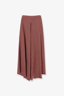 Alysi women’s satin skirt blue featuring a flowing rust-colored wide-leg midi design with lightweight fabric and asymmetrical hemline