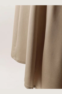 Alysi women’s beige satin skirt with smooth flowing drape and neatly stitched hem in satin material