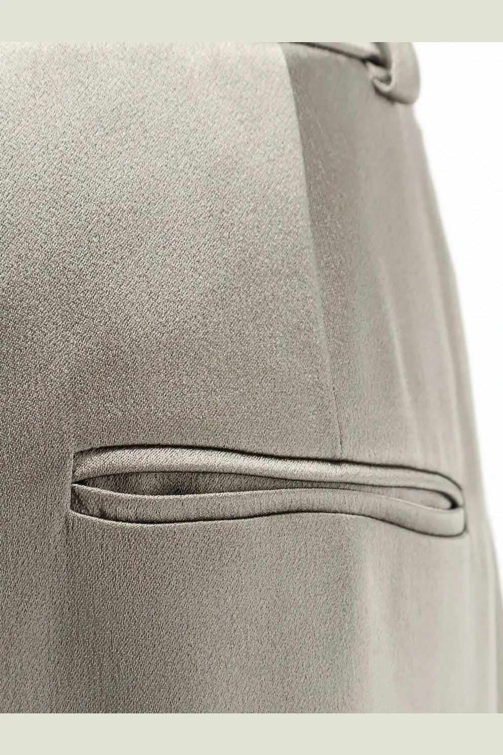 Alysi women’s beige satin trousers featuring a sleek gray satin-finish pocket on a tailored suit