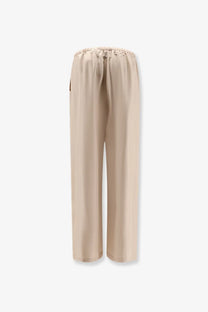 Beige satin wide-leg silk trousers with elastic waistband alysi women’s silk trousers petalo front view