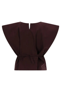 Alysi women’s sleeveless top in dark burgundy with wide flared shoulders and a cinched waist tied in a bow