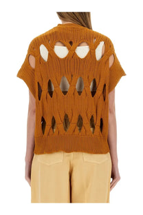 Back view of alysi women’s springtime jersey orange mustard-yellow knitted cardigan with geometric cutout pattern