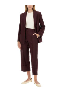 Alysi women’s tailored jacket red featuring a sleek structured silhouette and subtle pleats at the waistband