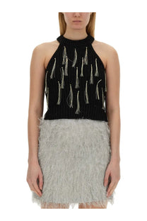 Alysi women’s black knitted halter top with silver tassels paired with a matching gray feathered mini skirt