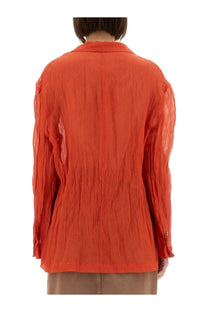 Alysi women’s wrinkled effect shirt in vibrant orange with long sleeves and textured crinkled fabric with vertical pleats