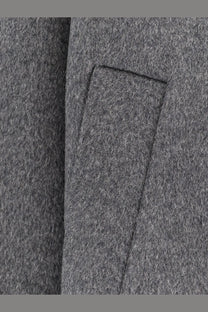 Gray wool coat pocket with subtle textured weave and neatly stitched edges on amaranto men’s outdoor wool coat gray