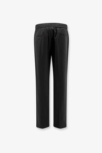 Back side of amaránto men’s black virgin wool blend athletic trousers with drawstring waistband and red stitching