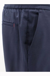 Amaránto men’s blue virgin wool blend trousers with dark navy drawstring waistband and subtle red pocket stitching
