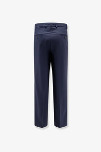 Navy blue tailored amaranto men’s virgin wool blend trousers with sleek straight-leg cut and subtle back pleats