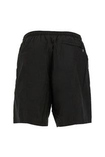 Ami Paris men’s black boxer swimsuit back view with elastic waistband and small zippered pocket