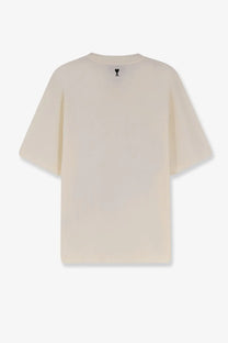 Ami Paris men’s oversized cream cotton t-shirt with a small black heart logo at the neckline