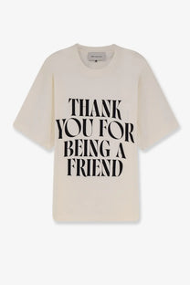 Ami Paris men’s cream-colored cotton t-shirt with bold black thank you for being a friend graphic on chest