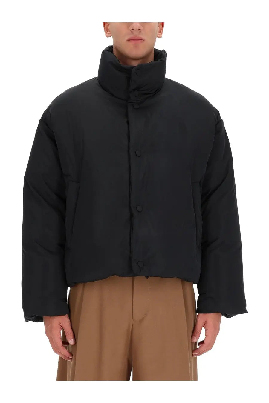 Black Ami Paris men’s Ami DE Coeur down jacket with high collar and front button closure in puffer style
