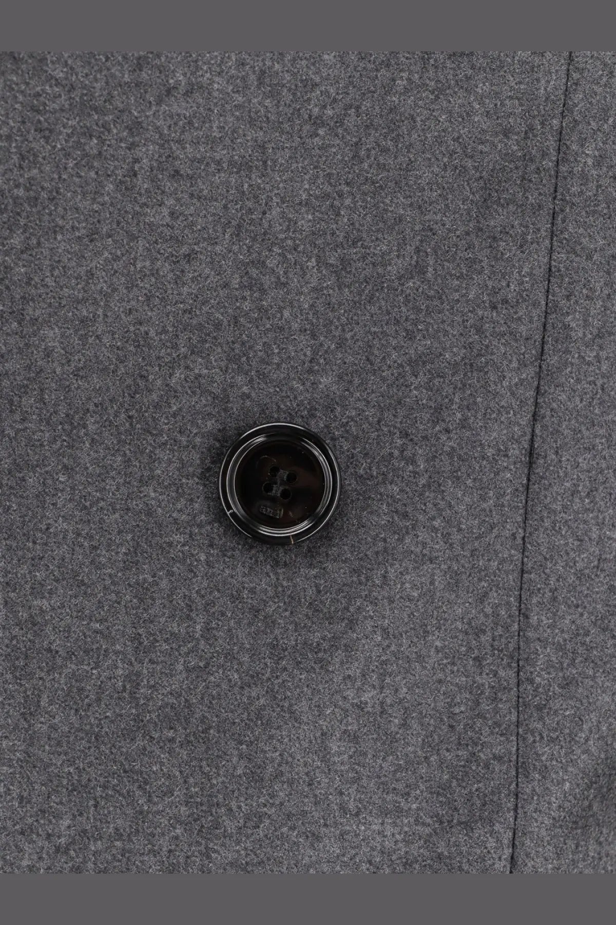 Black button with metallic rim on grey virgin wool fabric of ami paris mens double breasted blazer