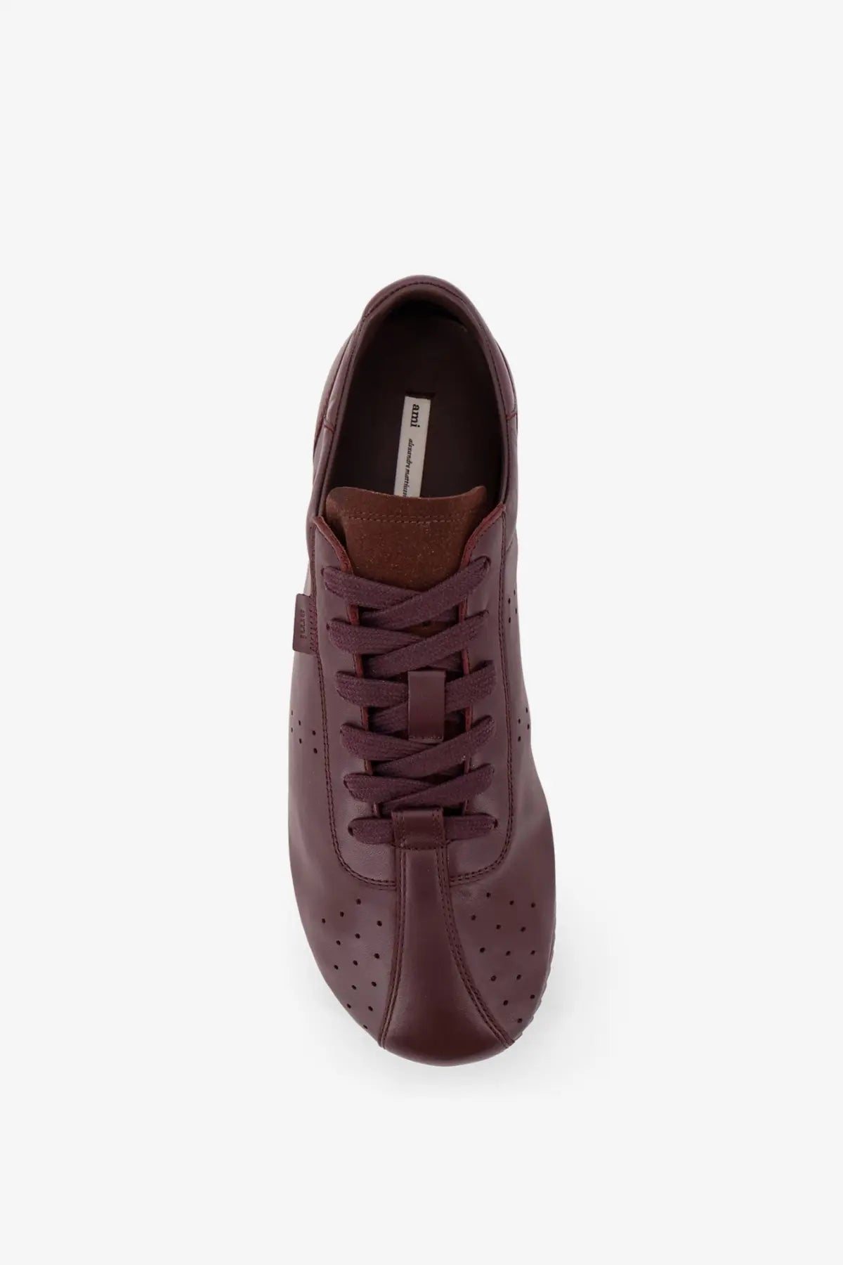 Ami Paris men’s leather low top sneaker in dark burgundy with perforated detailing and classic lace-up design