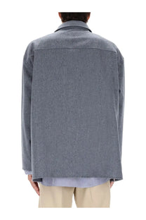 Ami Paris men’s long sleeved polo shirt in gray wool with a classic collar and textured finish