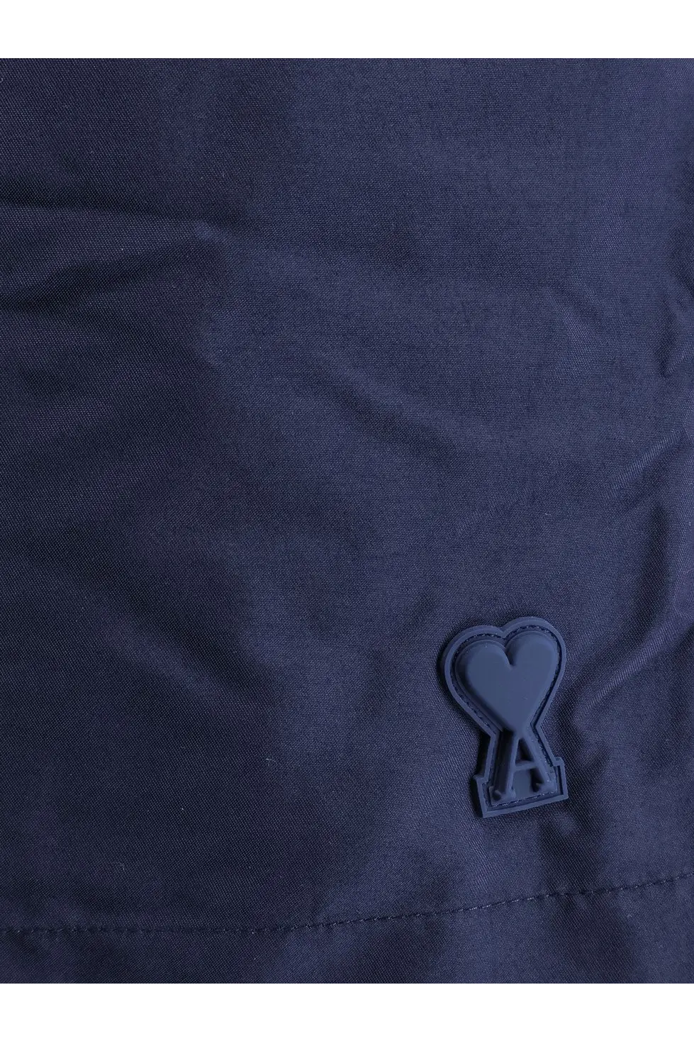 Ami paris men’s nylon swimsuit encre in dark navy with a matte black heart logo patch embossed with an a