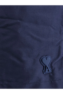 Ami paris men’s nylon swimsuit encre in dark navy with a matte black heart logo patch embossed with an a