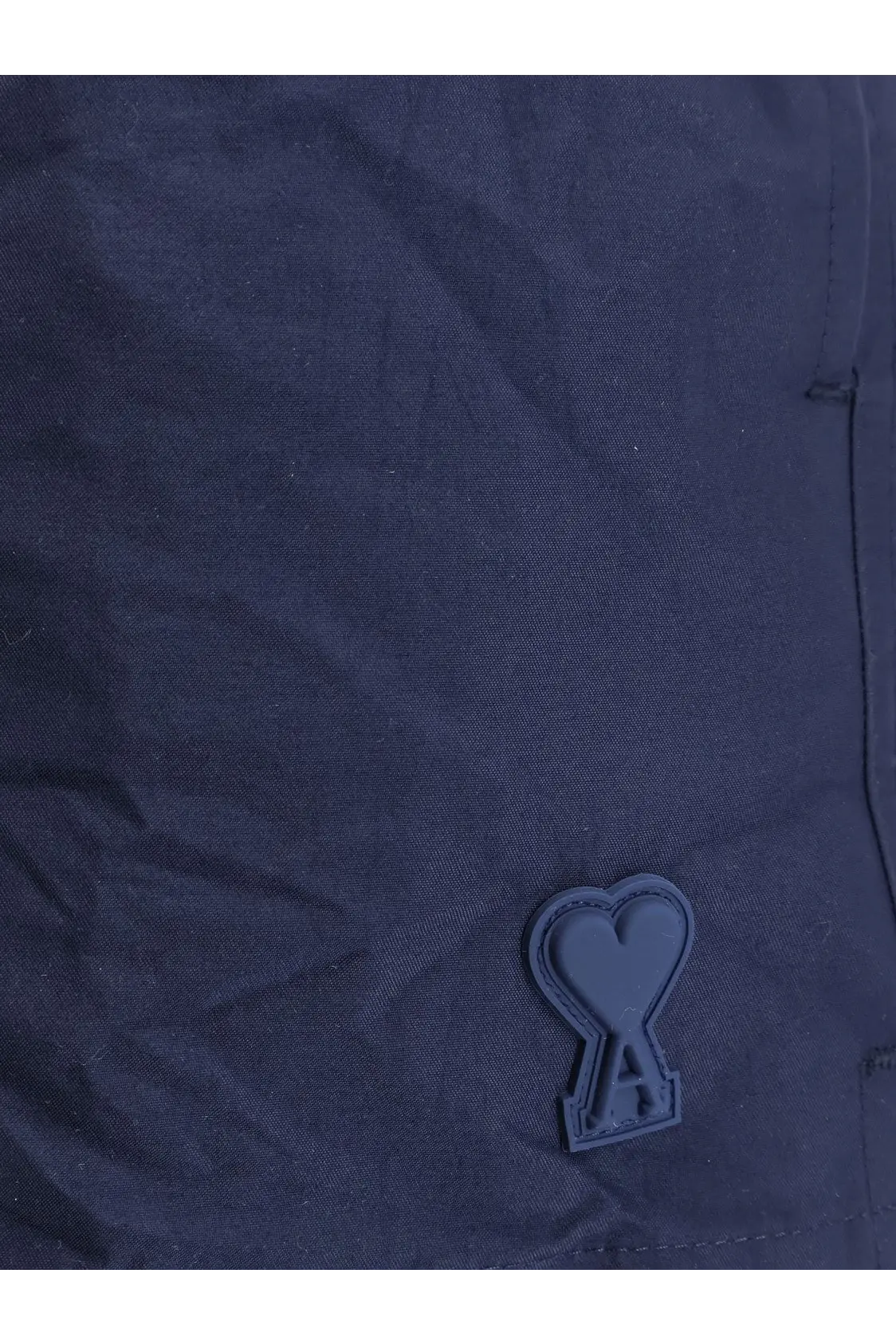 Ami paris men’s nylon swimsuit multicolor with dark navy fabric and matte black heart logo patch featuring letter a