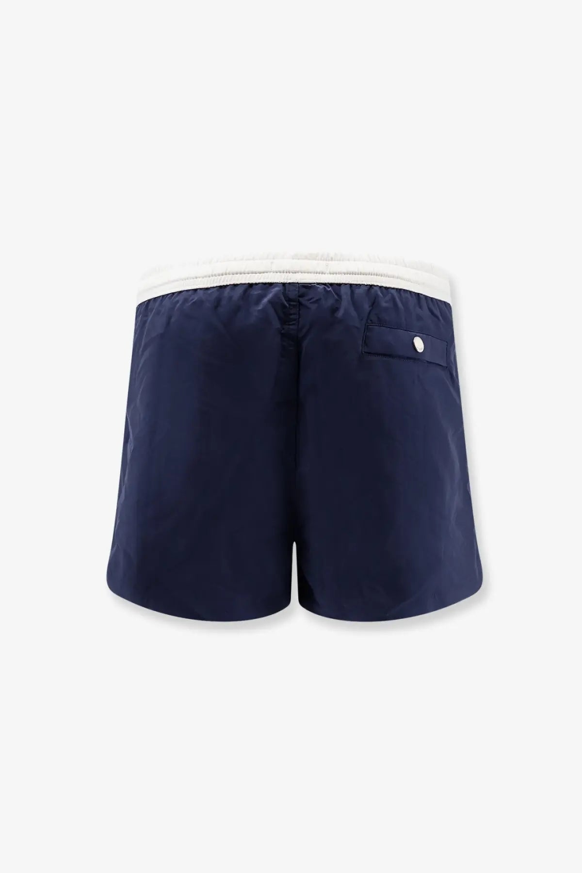 Ami Paris men’s nylon swimsuit navy blue swim trunks with white elastic waistband and silver button back pocket view
