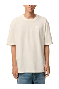 Ami Paris men’s cream cotton oversized t-shirt with a subtle embroidered logo on the left chest