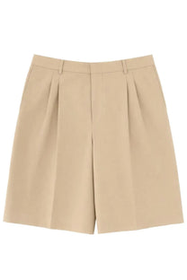 Beige Ami Paris men’s shorts with pleated design tailored waistband and clean structured style