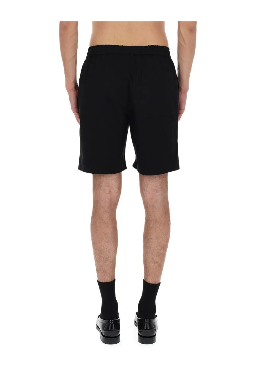 Ami Paris men’s black cotton shorts with elastic waistband and straight hem perfect for casual wear