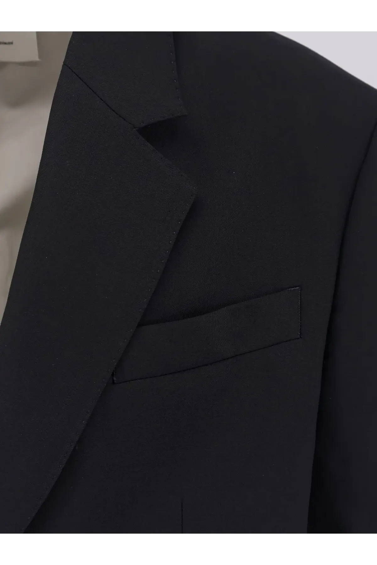 Ami paris men’s single breasted black virgin wool blazer with sleek structured lapel and single flap pocket