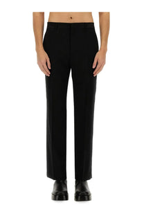 Ami paris men’s straight fit black tailored trousers with a straight-leg cut and minimalist design