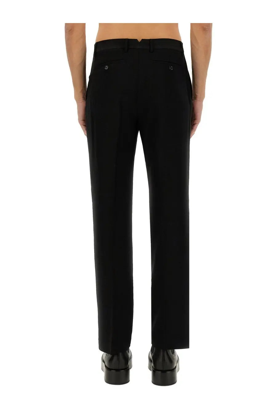 Black tailored ami paris men’s straight fit pants with sleek straight-leg cut and subtle back pleats shown from the back