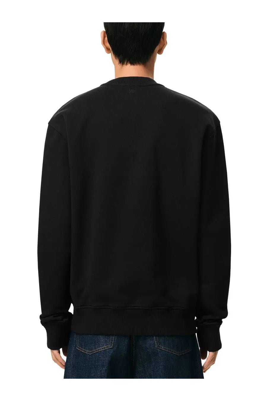 Ami Paris men’s black crewneck sweatshirt with ribbed cuffs and hem featuring a subtle logo at the neckline