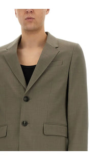 Ami Paris men’s two button jacket in olive green with tailored fit notched lapels and two front flap pockets
