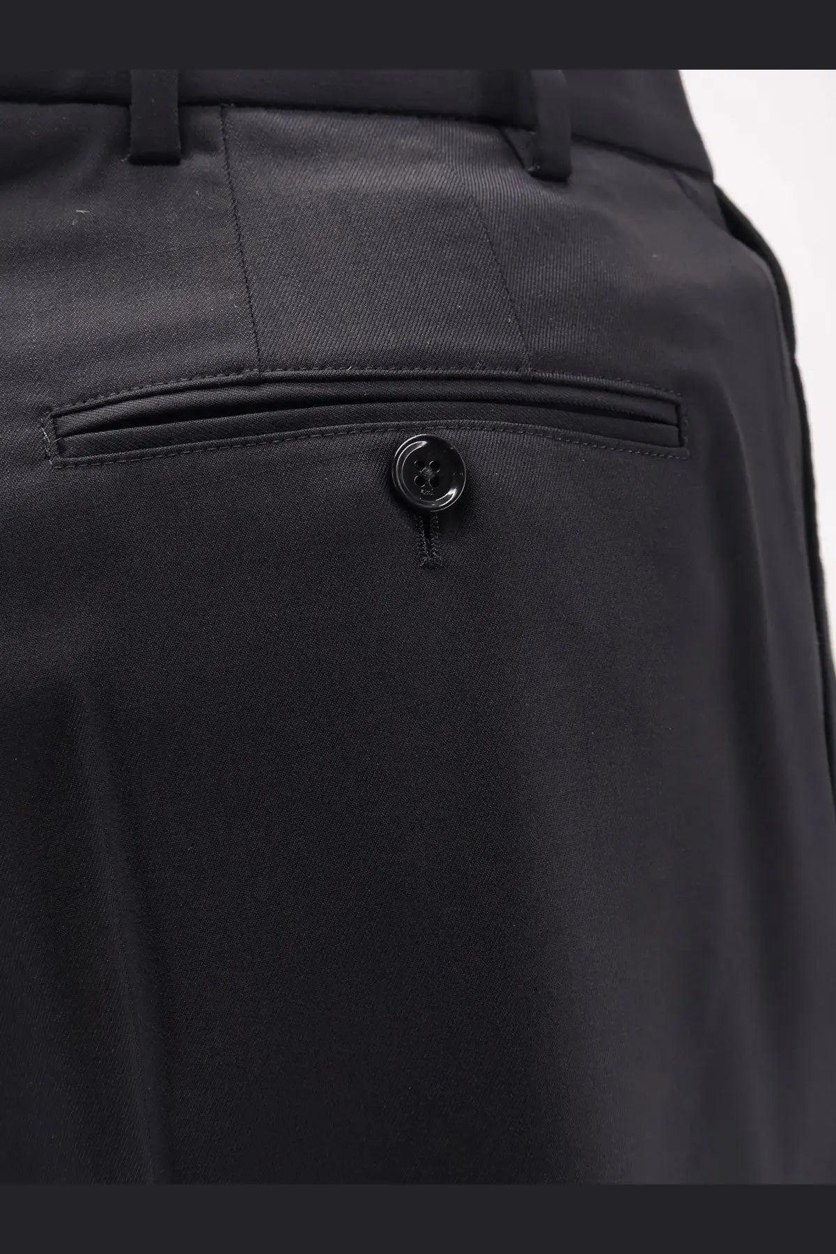Ami paris men’s virgin wool black trousers with sleek tailored design subtle texture and single button front pocket closure
