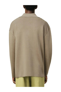 Beige ami paris men’s wool blend polo shirt with long sleeves structured collar and subtle ribbed texture