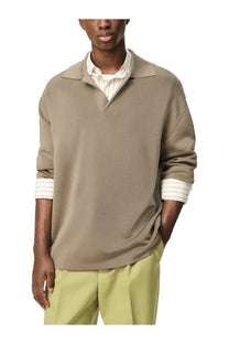 Beige textured knit polo shirt with ribbed cuffs and collar made from wool blend by Ami Paris for men