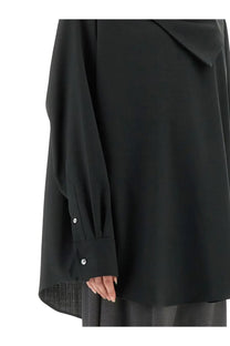 Black oversized blouse with long sleeves and silver buttons shown with ami paris unisex blue bandana grey accessory
