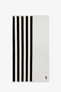 Ami Paris unisex cotton beach towel black with minimalist black and white stripes and a subtle heart logo in the corner