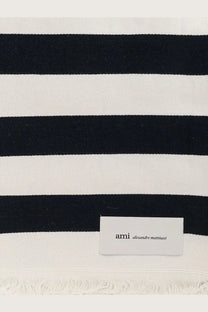 Ami paris unisex black and white striped cotton beach towel with fringed edge and ami alexandre mattiussi label