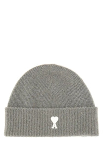 Gray ribbed knit beanie with white heart logo embroidered on the brim from Ami Paris Ami DE Coeur cap collection