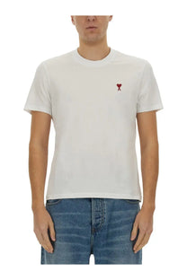 White cotton Ami Paris unisex shirt featuring a small red embroidered heart logo on the left chest