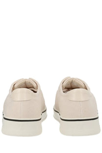 Beige canvas ami paris unisex tennis sneaker with black trim and white rubber soles designed for casual wear